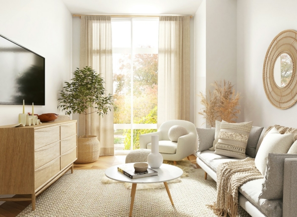 Helles Wohnzimmer in Naturtönen mit Sofa, Sessel und Zimmerpflanze